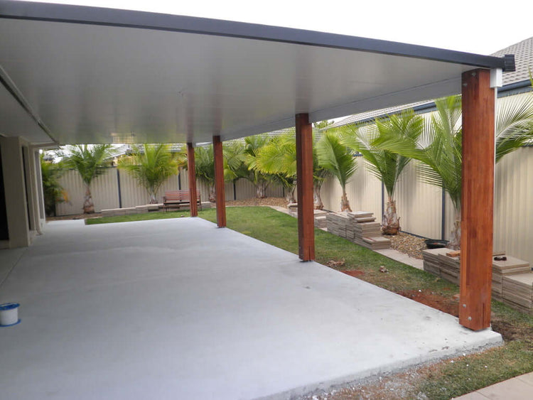 v-line single skin / insulated diy patio or carport kit attached to timber fascia in a residential backyard