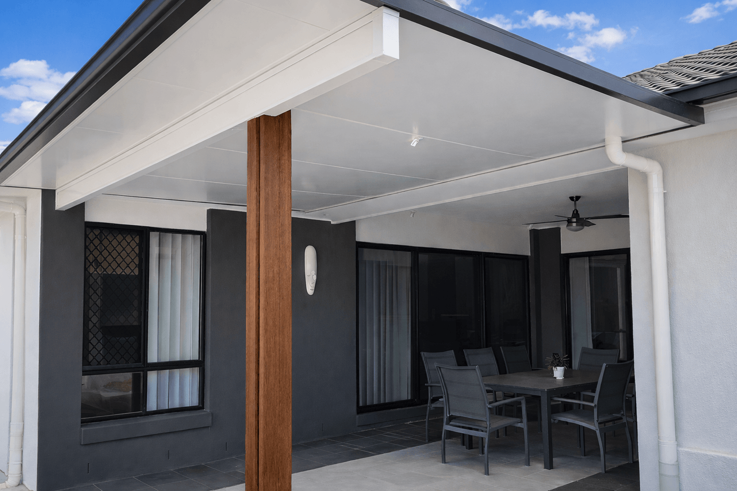 Insulated patio extension attached to home