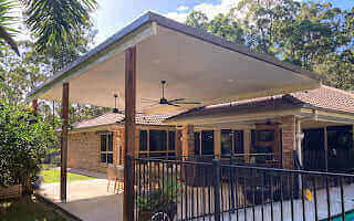 Reverse insulated flyover patio or carport with bold timber posts, crafted to create an open, stylish, and inviting outdoor space.