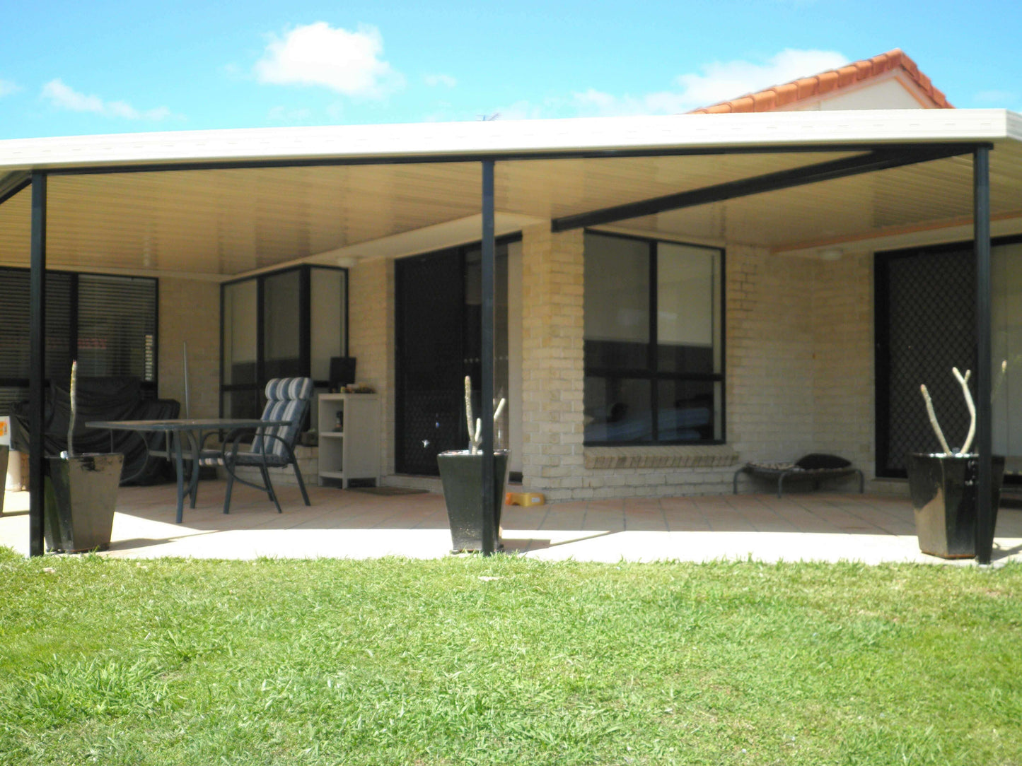 DIY Kit: V-Line Single Skin Patio/Carport Attached To Masonry/Brick/Concrete Wall 9 x 5.7m with 600mm Overhang