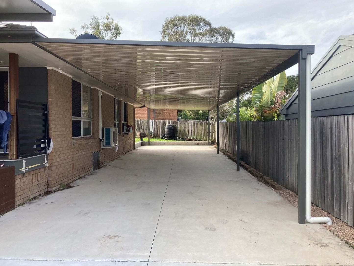 V-Line Single Skin Patio/Carport Attached To Timber Fascia 7 x 5.7m with 600mm overhang