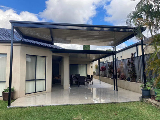 Stylish DIY insulated patio with roof, creating a functional outdoor space for comfort and relaxation.