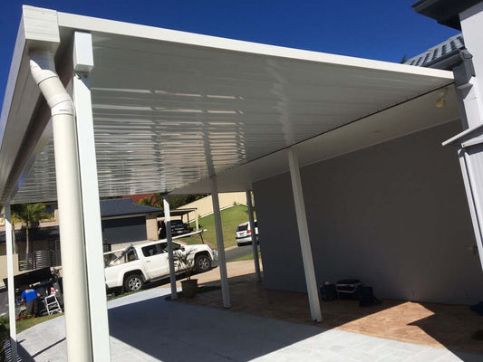 Single skin V-Line patio roof attached to house with steel posts, providing durable patio roofing and covered outdoor living space for an Australian home.