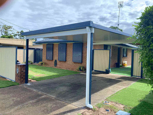 Elegant single-skin free-standing patio or carport in a residential setting, engineered for lasting durability and designed to provide long-term protection and comfort.